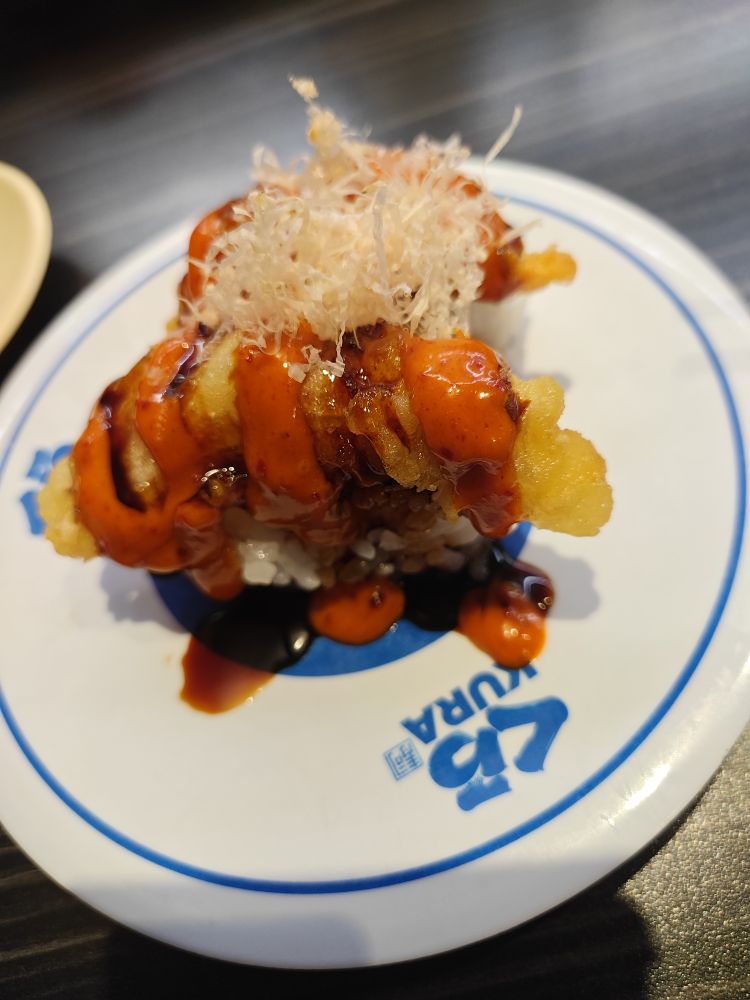 Spicy crunchy squid at kura sushi, for a promotional event involving hololive members ninomae ina'nis, ouro kronii, and gigi murin. 