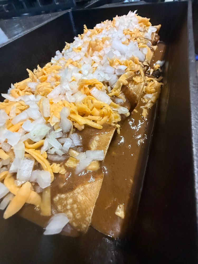 Uncooked enchiladas ready for the oven
