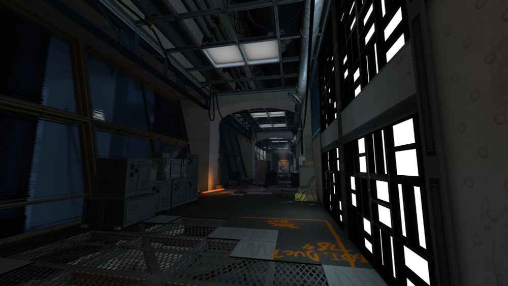 A screenshot from Portal: System Failure (a Strata Source game.)

A long dimly lit grey corridor with missing tiles and gratings exposed in all directions. There is a large window to the left, showing a huge underground cave, and there is a set of white wall panel lights shining from the right.