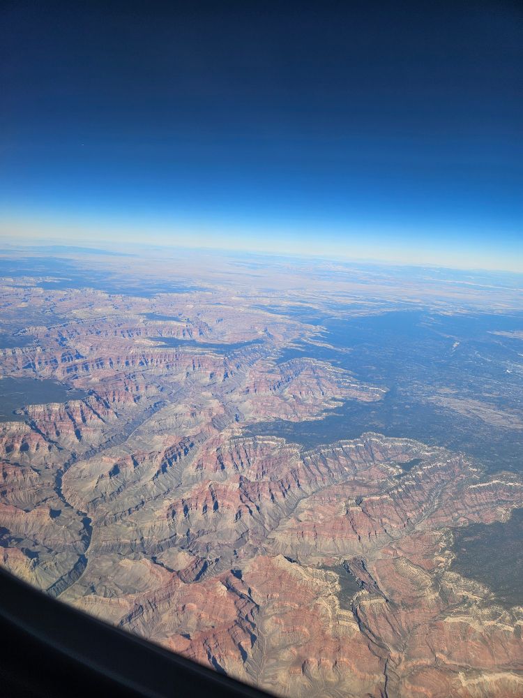 A picture of the Grand Canyon from an airplane high above 