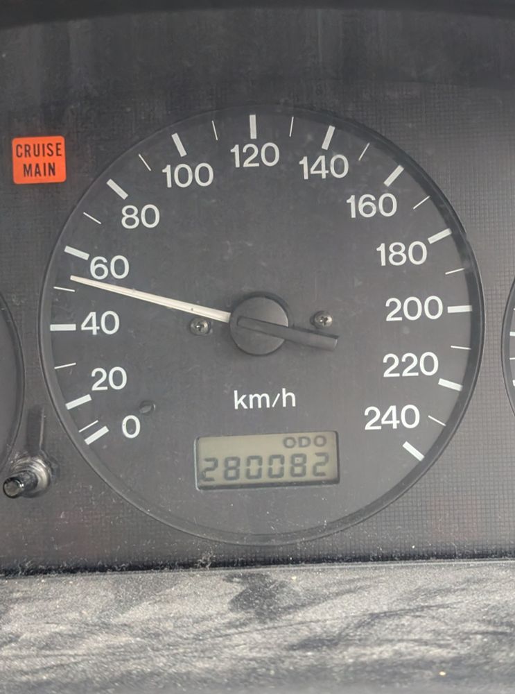 a car's odometer showing 2 8 0 0 8 2