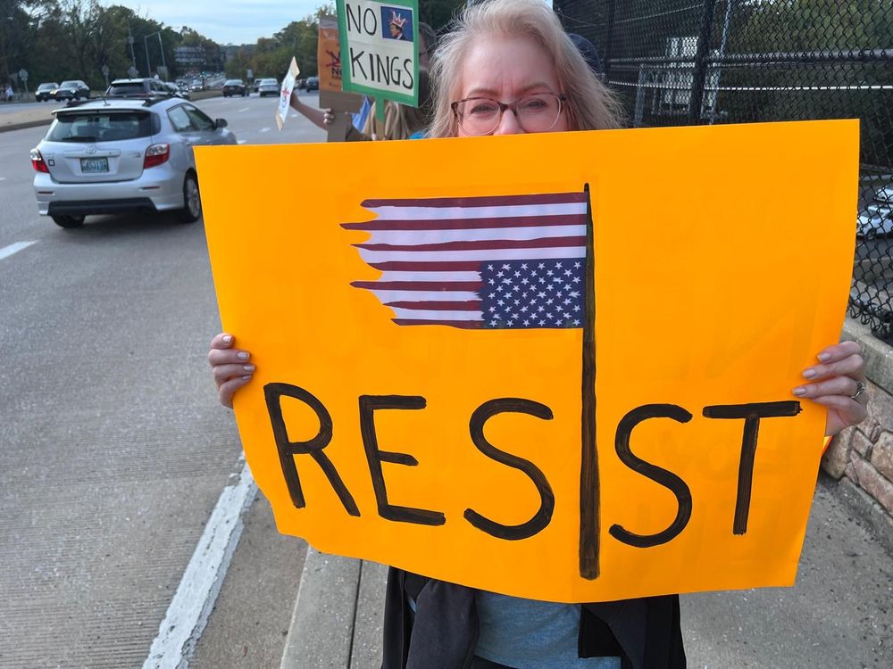 Resist with damaged upside down American flag