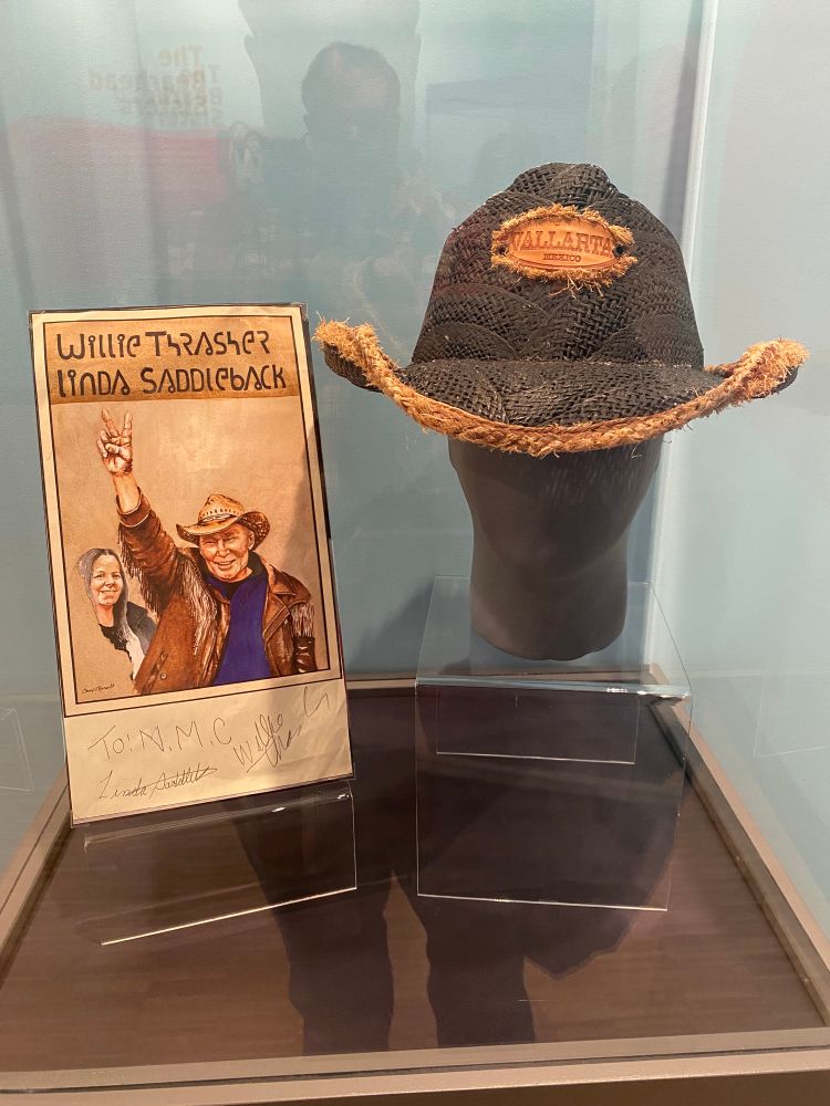 Signed poster by Willie Thrasher and Linda Saddleback and Willie Thrasher’s hat at the National Music Centre in Calgary, Alberta.