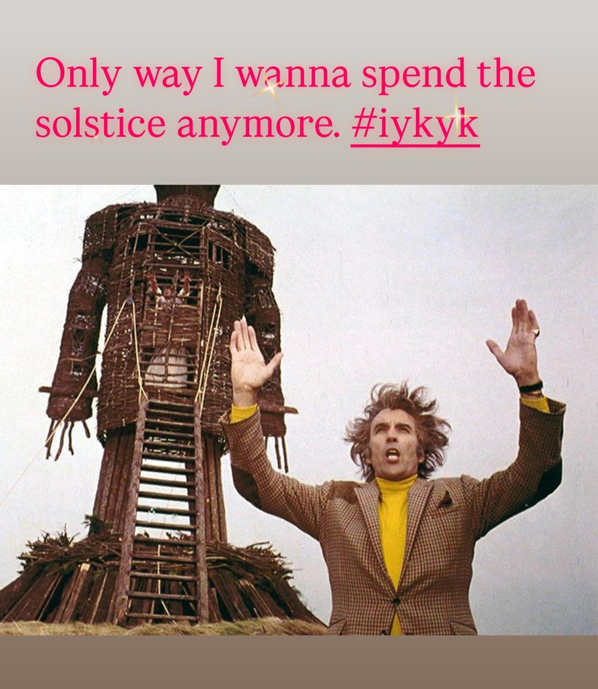 Scene from The Wicker Man. Christopher Lee in front of the effigy, with the investigator inside. 