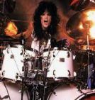 young Tommy Lee druming