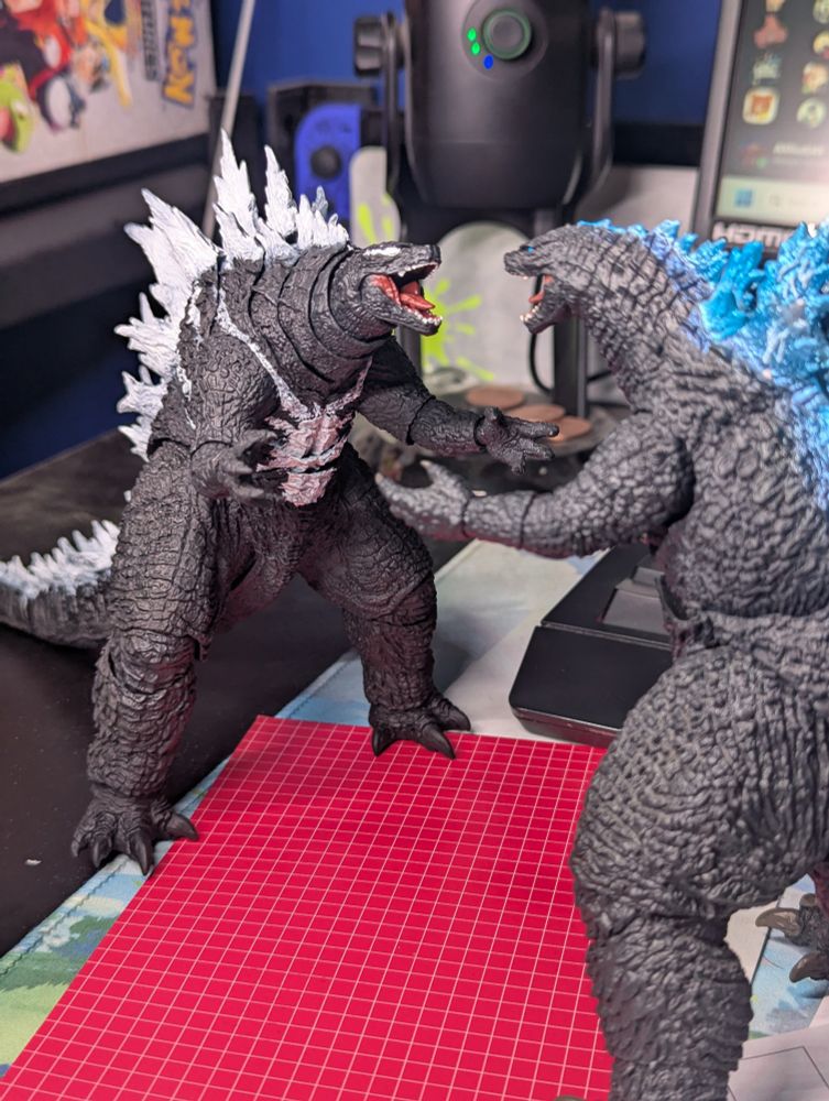 Venom Godzilla starting down regular Godzilla 