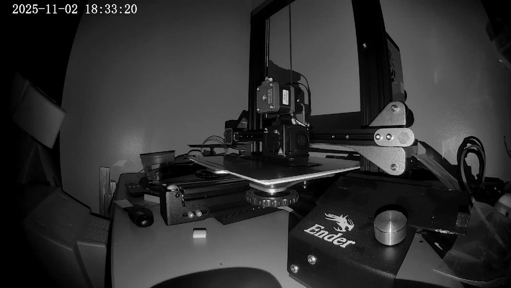 Picture of a 3D printer making a CD32 expansion cover. 