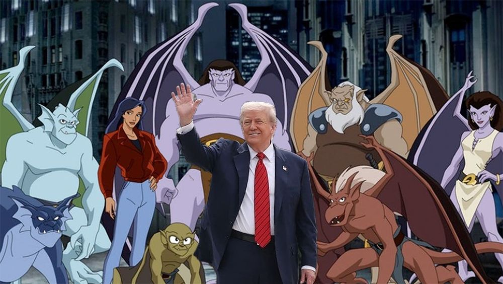Donald Trump waving while standing in front of the cast of Disney's Gargoyles.