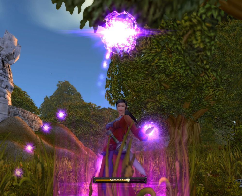 A human warlock summoning an imp