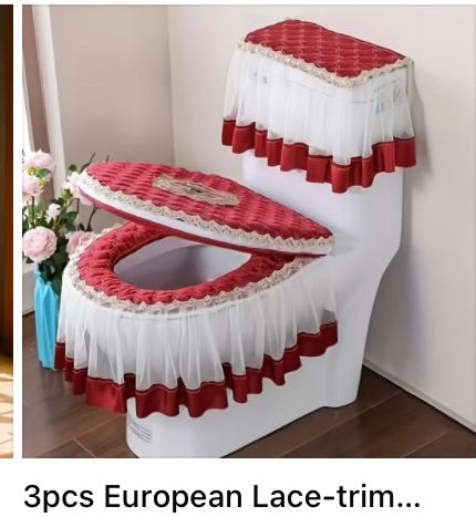 White and red lace trims for a loo, with chintzy red and white lace trim for a loo seat, below the rim of the loo seat, and the cistern 