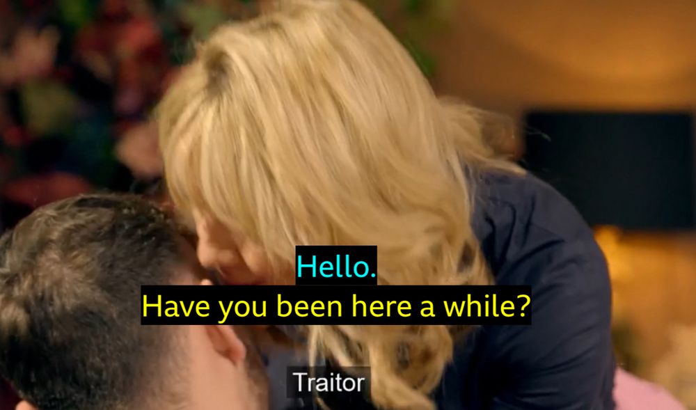 Frankly whispering traitor into Jake’s ear