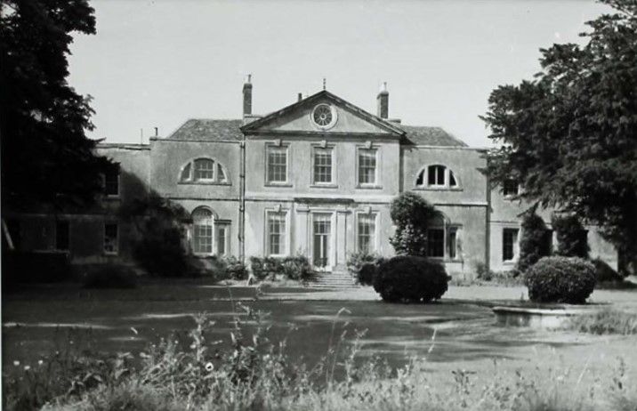Oving House: garden front