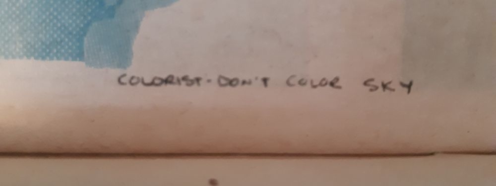 Close up on some handwritten text at the side of the page saying "COLORIST - DON'T COLOR SKY"