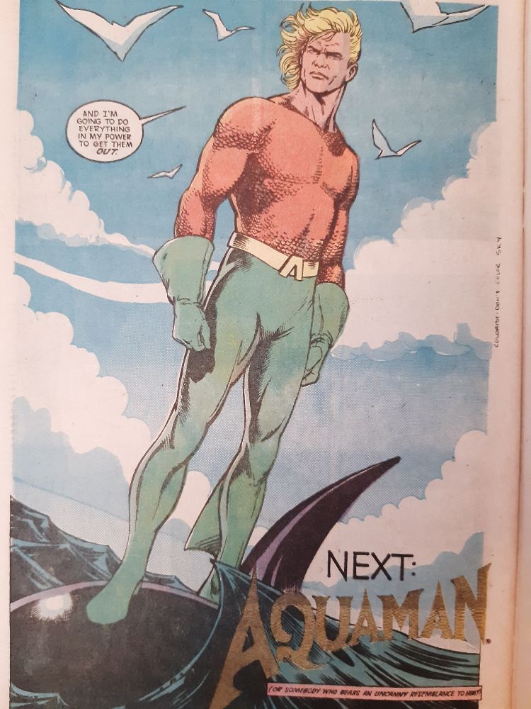 Splash (!) Page showing Aquaman standing on the back of one of his fishy friends against a blue sky