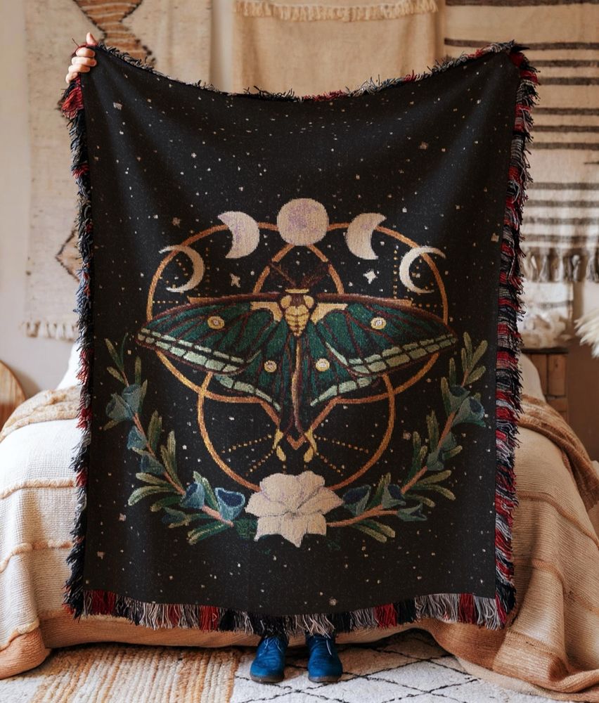 Spanish moon moth painting on a woven blanket