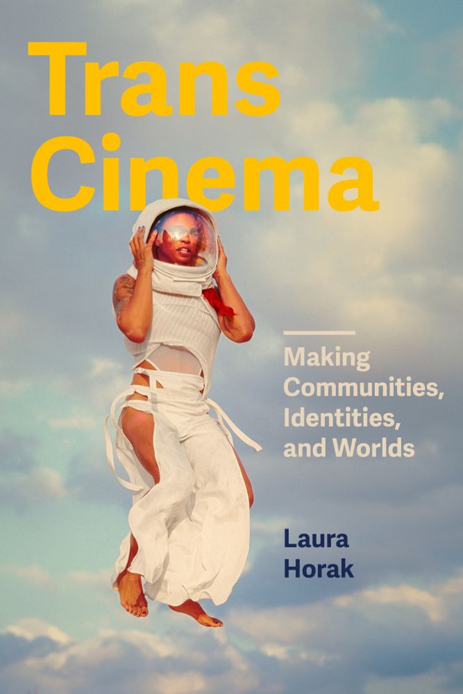 A brown-skinned trans woman in an astronaut's helmet and white tunic floats in front of a blue sky with fluffy white clouds. Text: "Trans Cinema" Making Communities, Identities, and Worlds. Laura Horak"