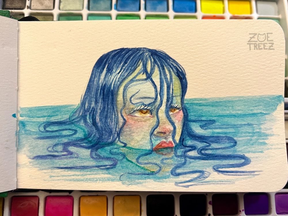 watercolor sketch(?) / painting by Zoë Treez - 2025 (5” x 3.5”)

greenish yellow femme face peaking out from blue water that is up to their mouth. their long wet hair floats and squiggles on top of the water’s surface 
