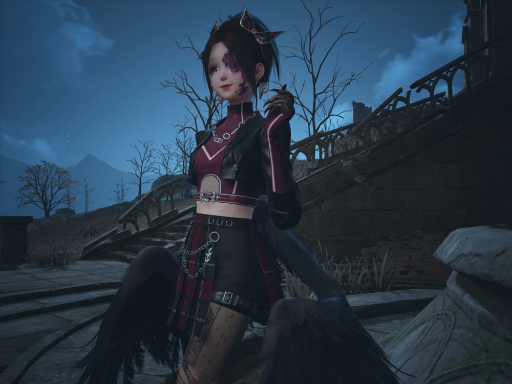 A closeup of Nikki at night in the Queen's ruins wearing a black and crimson coordinated outfit with wings. 