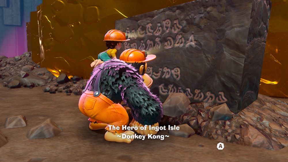 DK and Pauline reading a sign that says:
"The Hero of Ingot Isle
~ Donkey Kong ~"