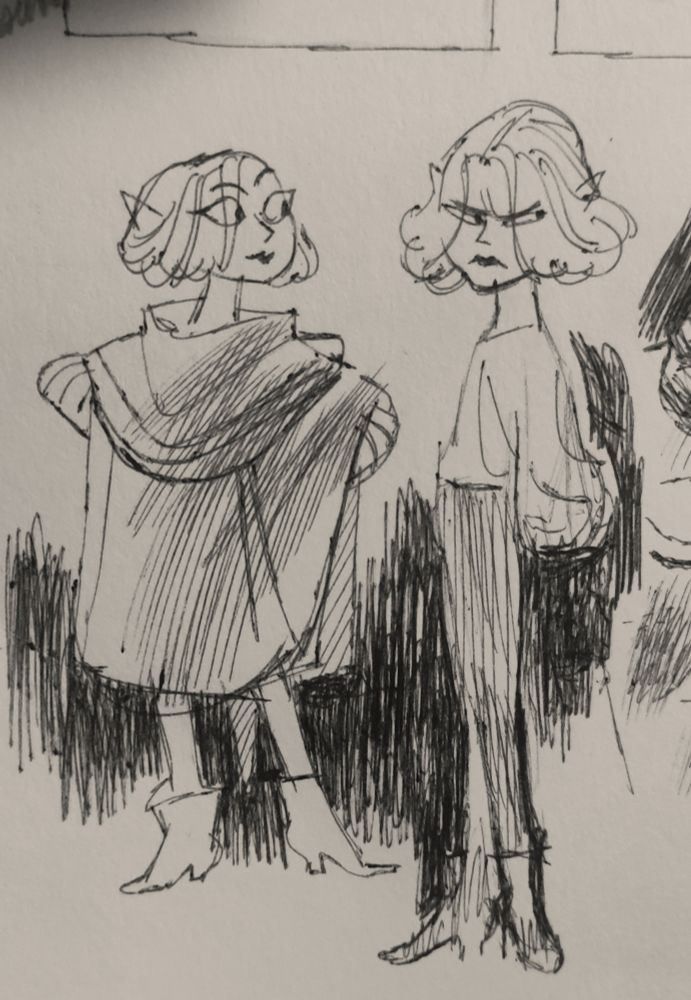 Him standing, with and without his cape