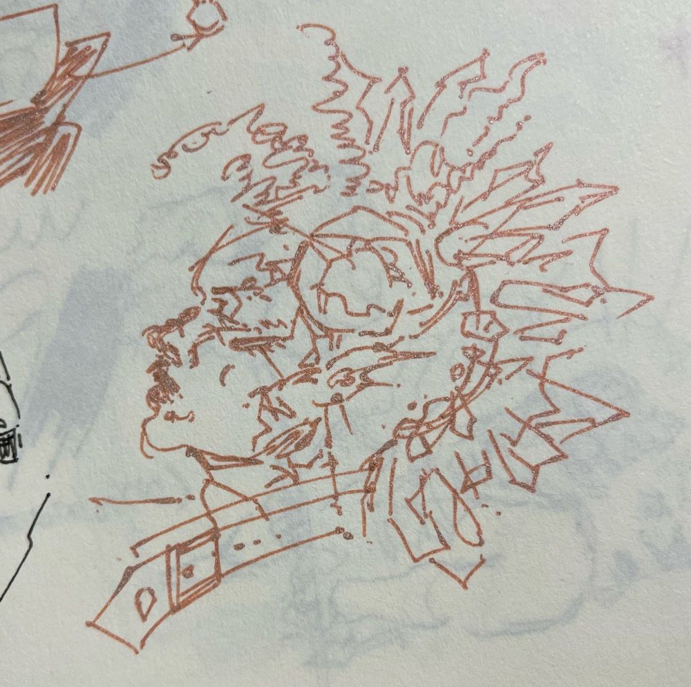 side profile of ashton in bronze glitter pen, showing off their crystal brain.