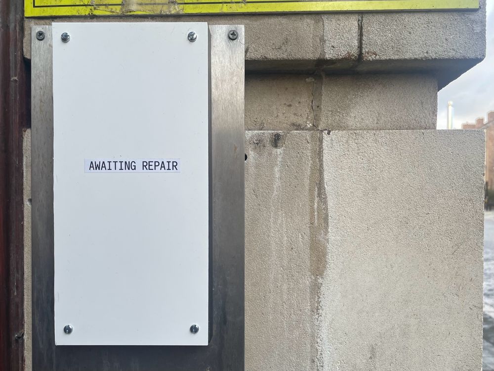 Doorbell replaced with a sign saying ‘Awaiting Repair’