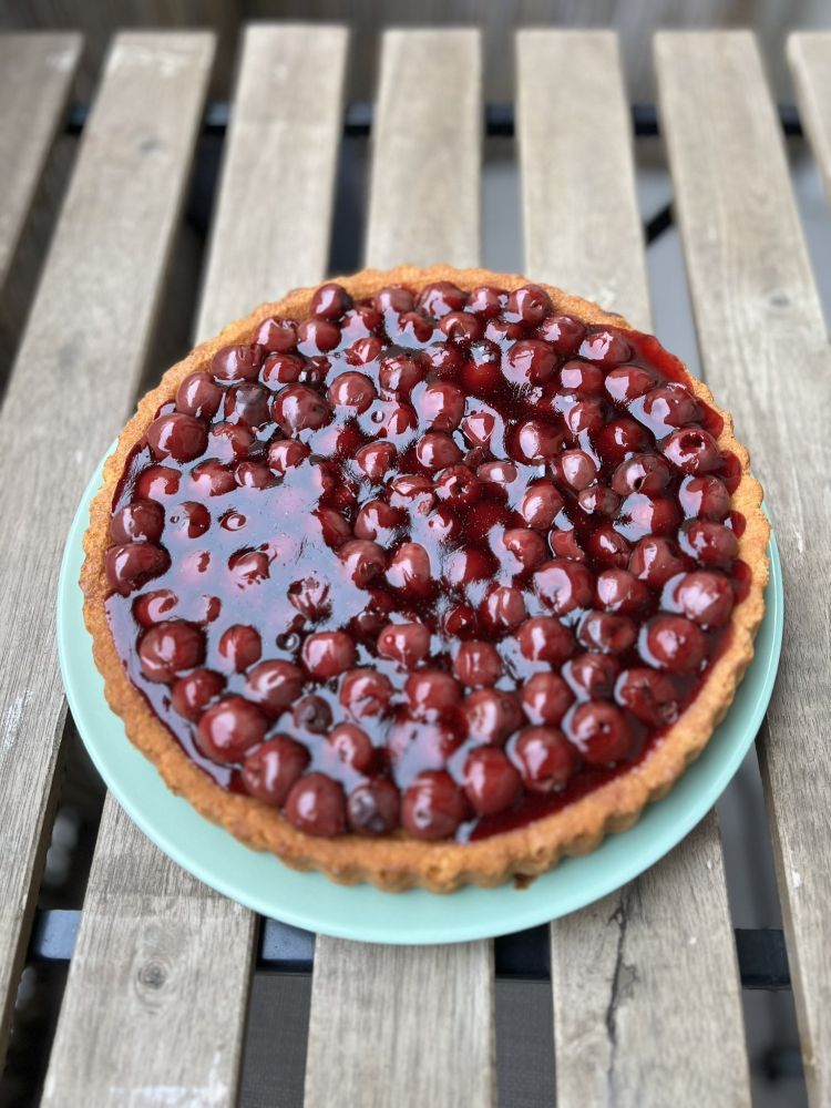 cherry cake on a wooden table
