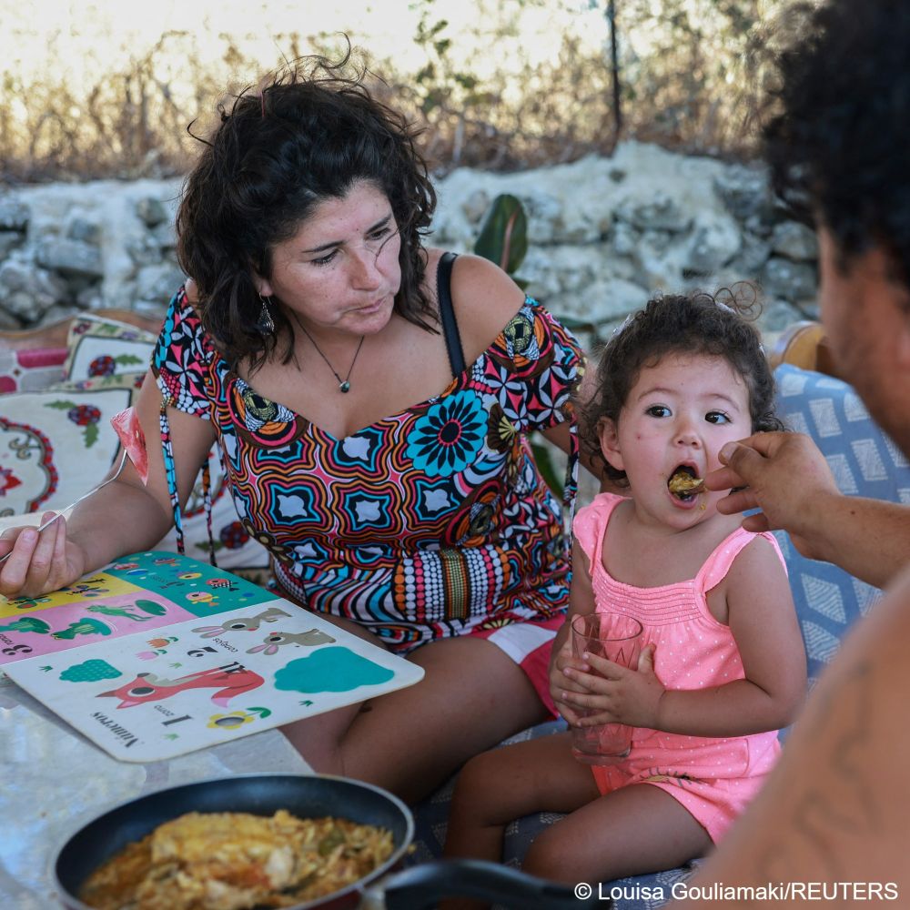 Fabiola Velasquez and Sohrab Shirzad, now a recognized refugee fled his homeland Afghanistan after being attacked by the Taliban. The couple met when Shirzad sought treatment from Velasquez on Lesbos. Now, they raise their daughter together and try and heal the wounds and souls of other arriving migrants, refugees and asylum seekers.
