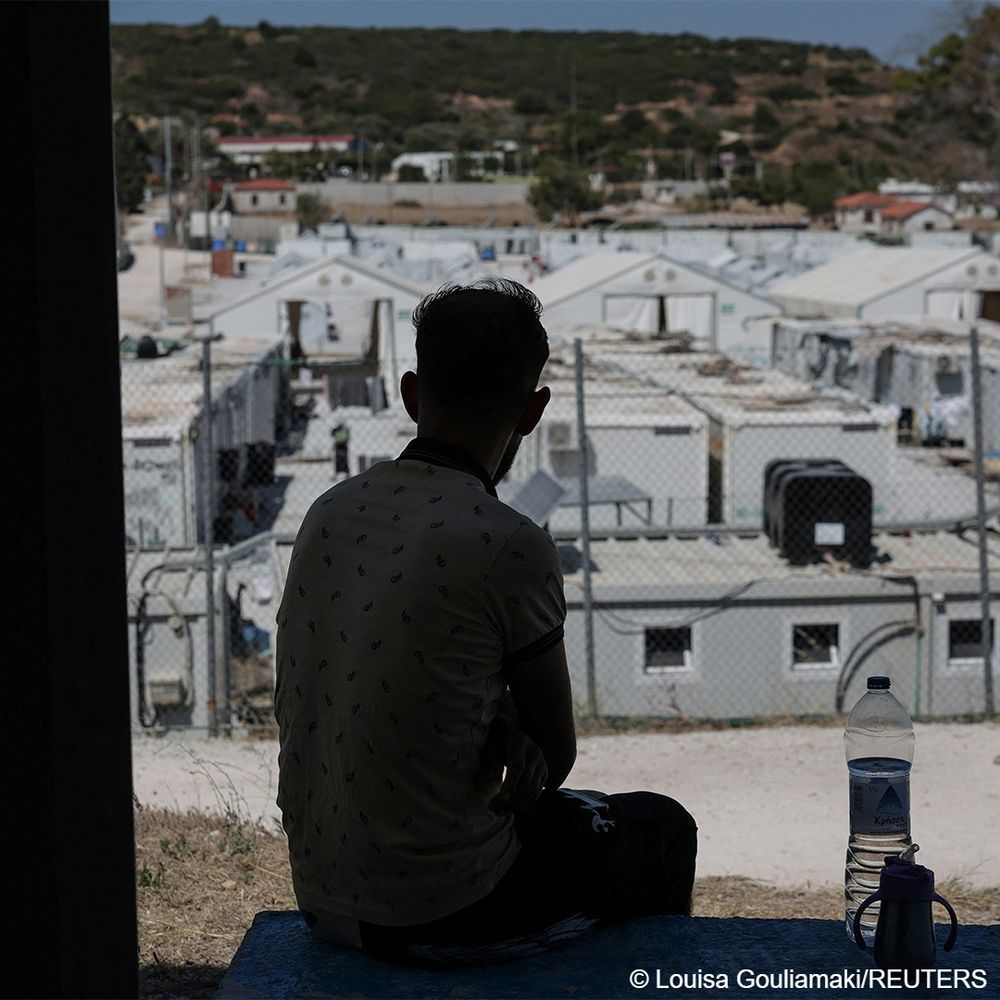 A refugee looks at the temporary Kara Tepe Refugee Camp in Mavrovouni, Lesbos island, Greece June 27, 2025.