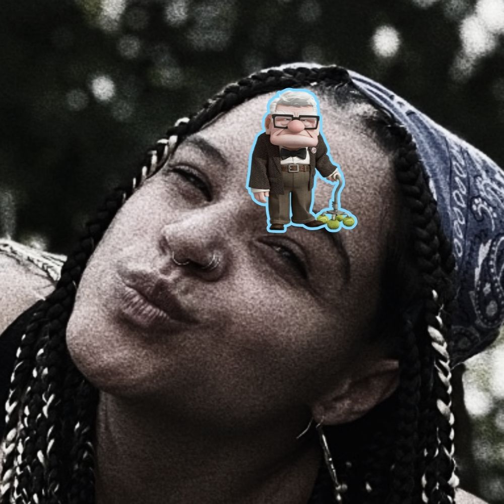 A close-up of Katskratchh's face with a small picture of the grumpy old man, Carl from the Pixar movie Up.