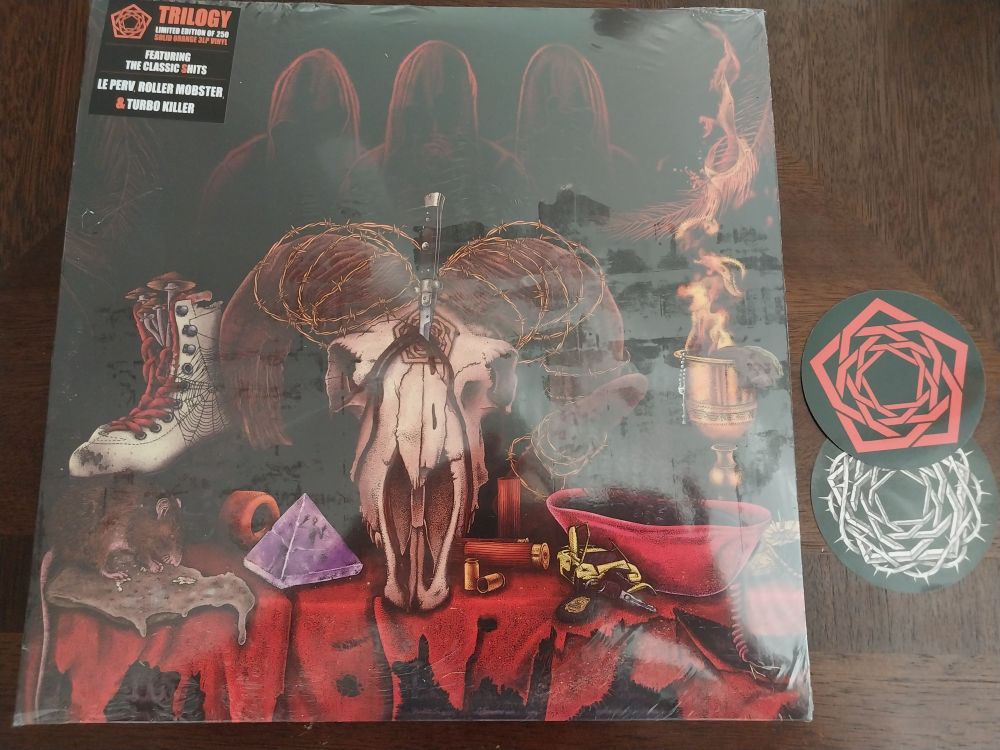 Carpenter Brut's TRILOGY on vinyl + two bonus stickers