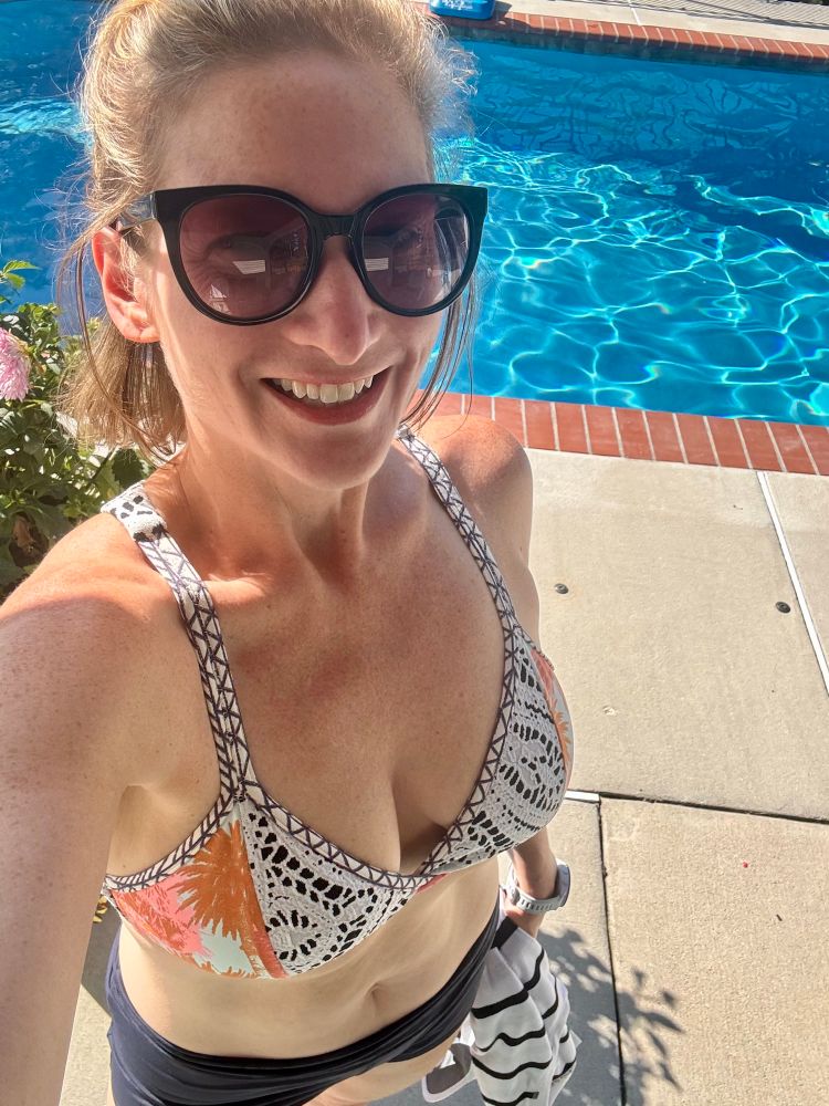Me, a 40 something lady in I guess what could be considered a bikini. The pool is behind me 