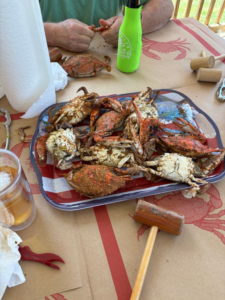 A tray of steamed blue claws just fucked up with Old Bay seasoning 