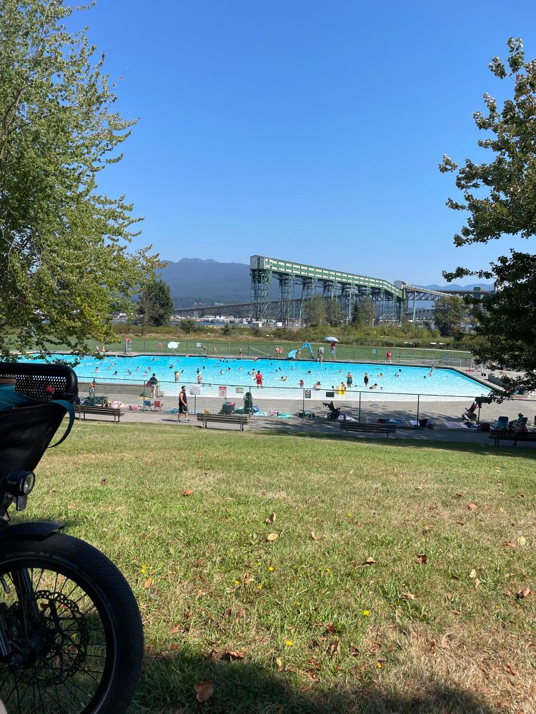 View of North Shore Mountains in Vancouver. Pool is a great outdoor public facility used by many.  