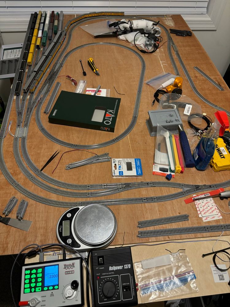 N-scale model train layout on a 4x6ft board.