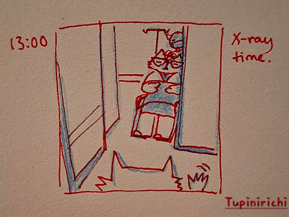 My grandma in a wheel chair taken by a nurse and me saying bye bye. She has a calm expression in her face and the nurse is using a face mask 😷 
On the top left corner it says 13:00
On the top right corner it says X-ray time