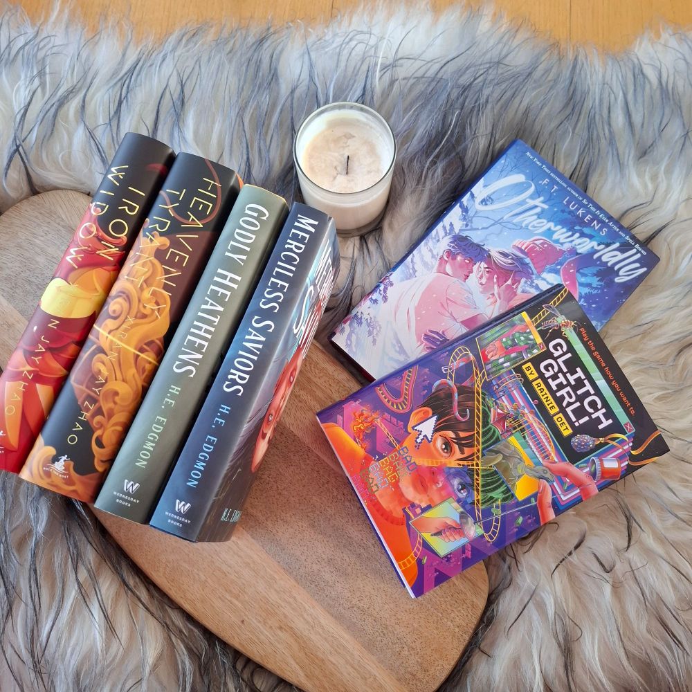 A photo of Anniek's physical TBR for the Trans Rights Readathon, featuring 6 books:
☆ Iron Widow - Xiran Jay Zhao
☆ Heavenly Tyrants - Xiran Jay Zhao
☆ Godly Heathens - H.E. Edgmon
☆ Merciless Saviors - H.E. Edgmon
☆ Otherworldly - F.T. Lukens
☆ Glitch Girl - Rainie Oet.