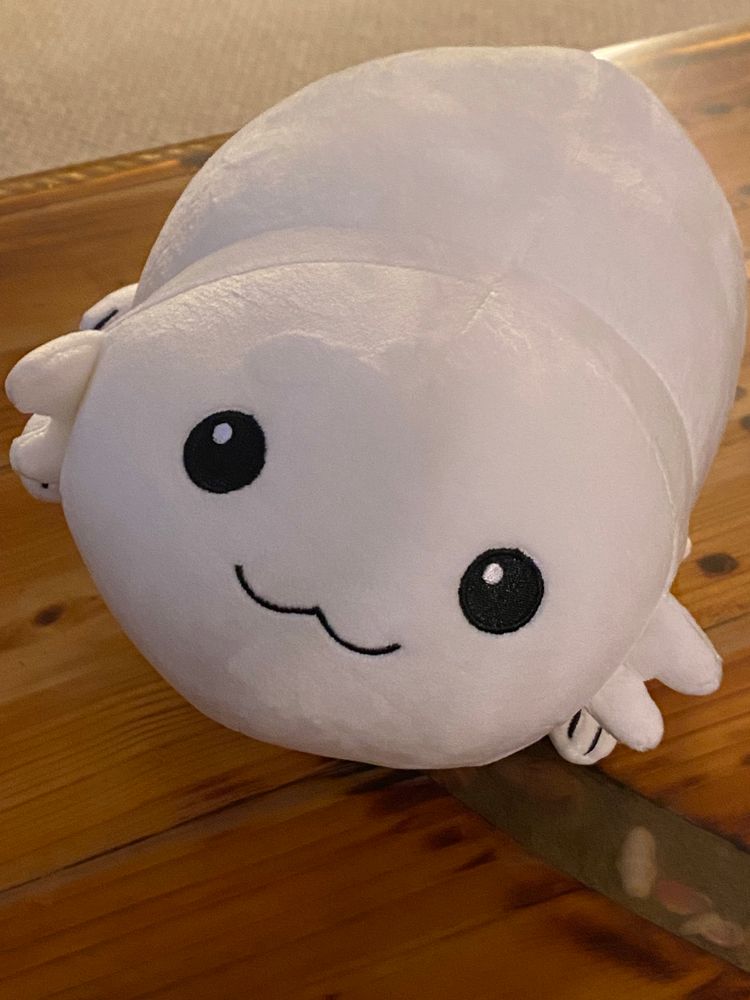 A large plush stuffed toy based on the character Moopsy from Star Trek: Lower Decks. 