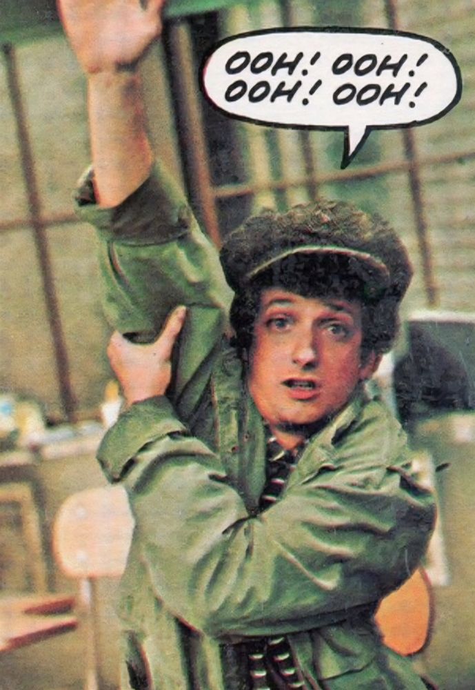 Photo of Arnold Horshack from the television series, Welcome Back Kotter, in his iconic pose with his hand raised enthusiastically over his head shouting urgently, ooh, ooh, ooh, ooh! (pick me to answer)