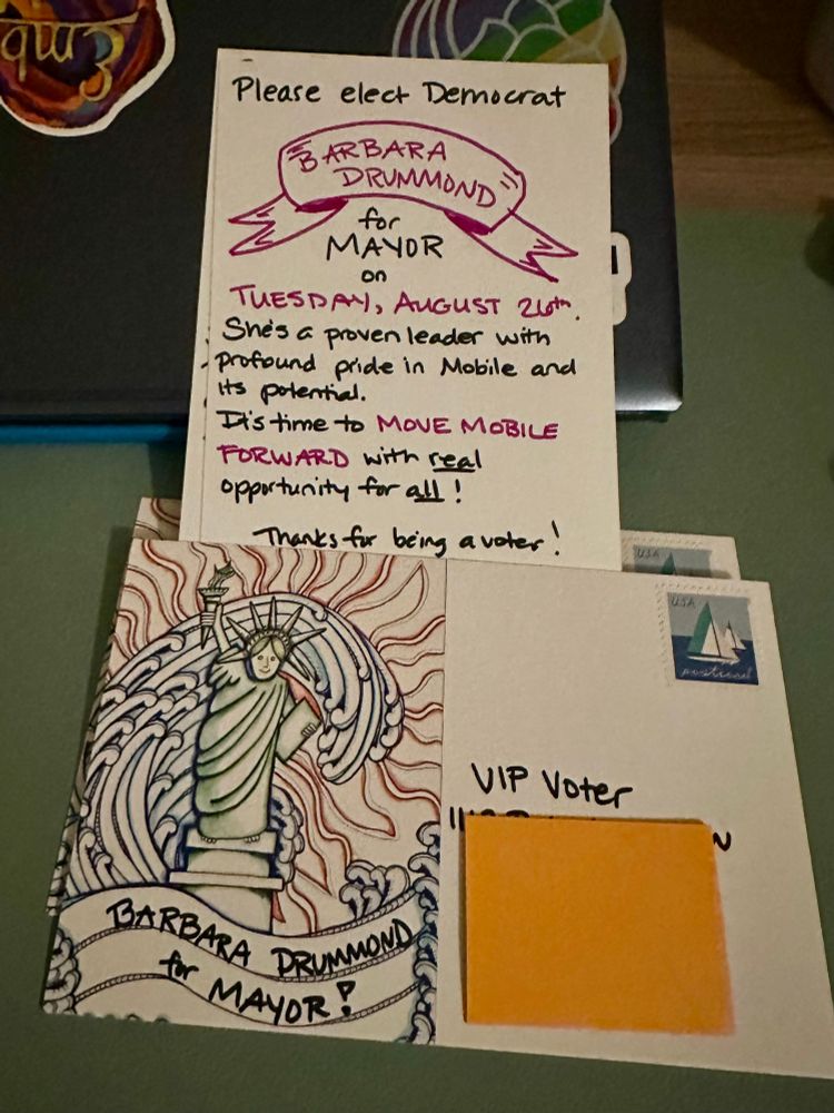 A stack of five postcards with a drawing of the Statue of Liberty on one side and the message “Please elect Democrat Barbara Drummond for Mayor on Tuesday, August 26th. She's a proven leader with profound pride in Mobile and its potential.It's time to move Mobile forward with real opportunity for all.” on the other. 