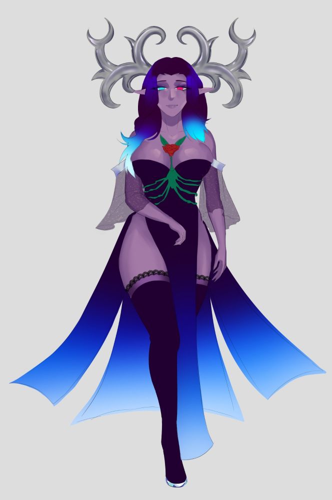 Amara wearing a long blue dress with green vines. She's walking towards the viewer.