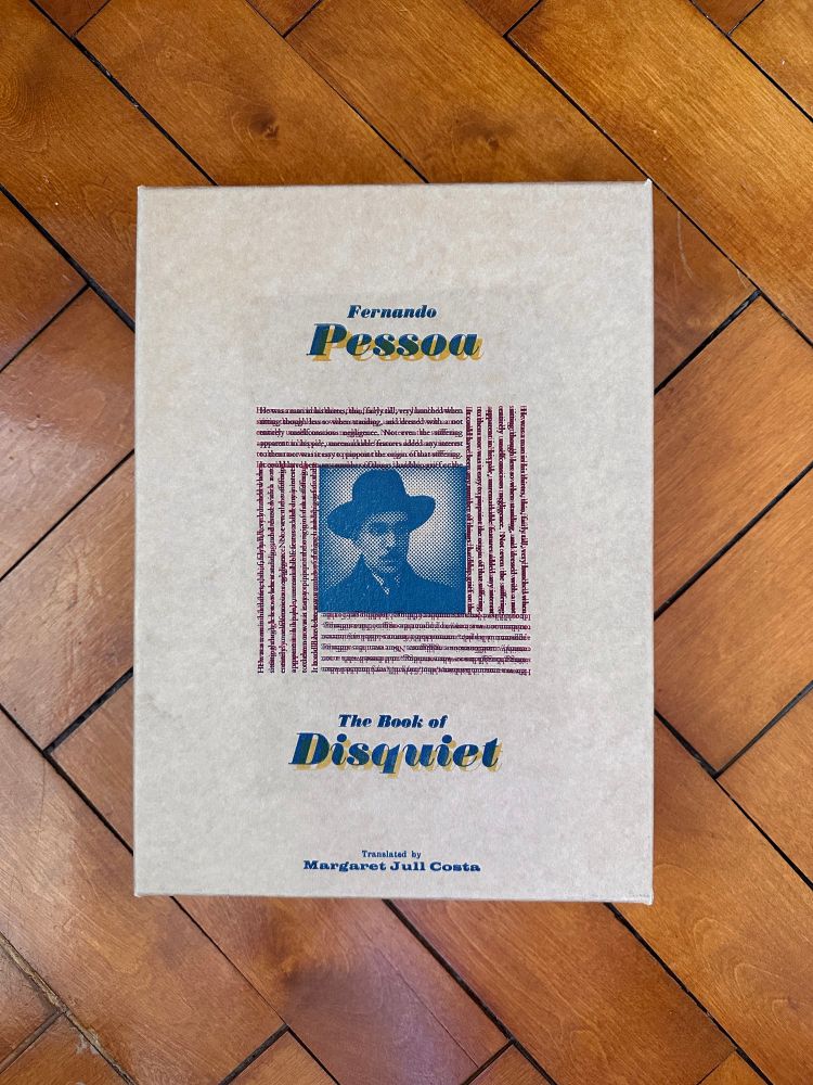 Cardboard box letterpressed with the title and author