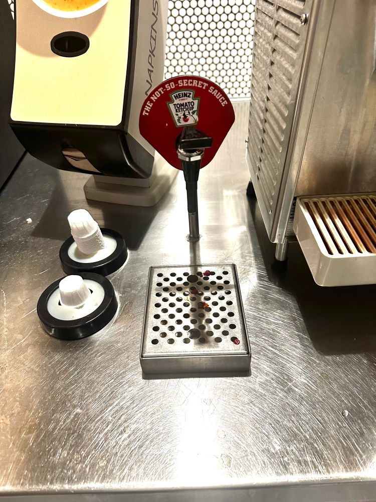 a ketchup dispenser at a Raising Canes