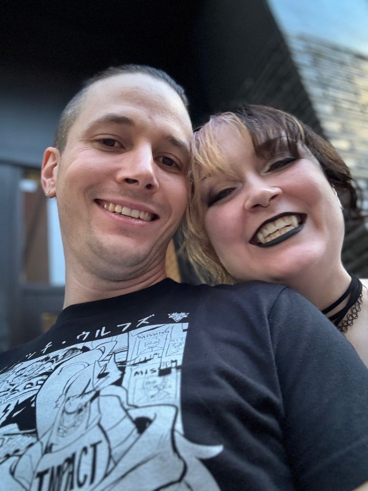 Selfie of my partner and me. Smiling and happy