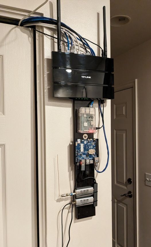 Home network and automation equipment mounted on a wall.