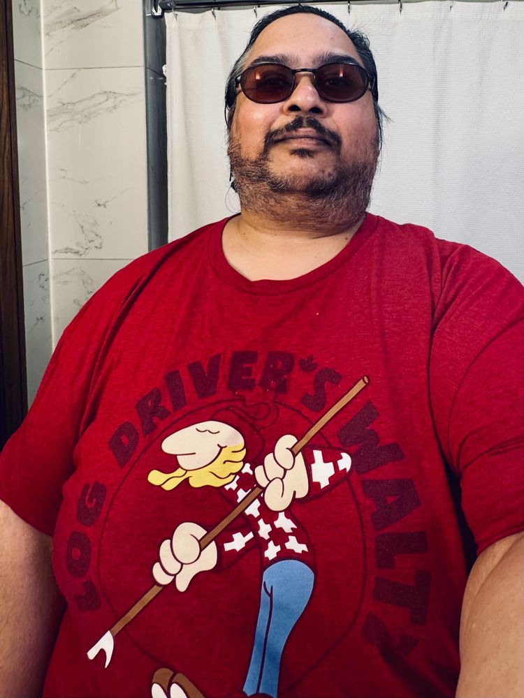 My Canada Day Selfie. 

Wearing shades and my red Log Driver's Waltz t-shirt.