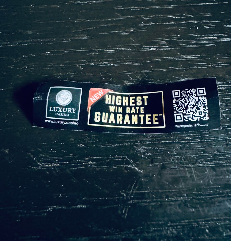 Slip of paper from a fortune cookie. From left to right, reads 