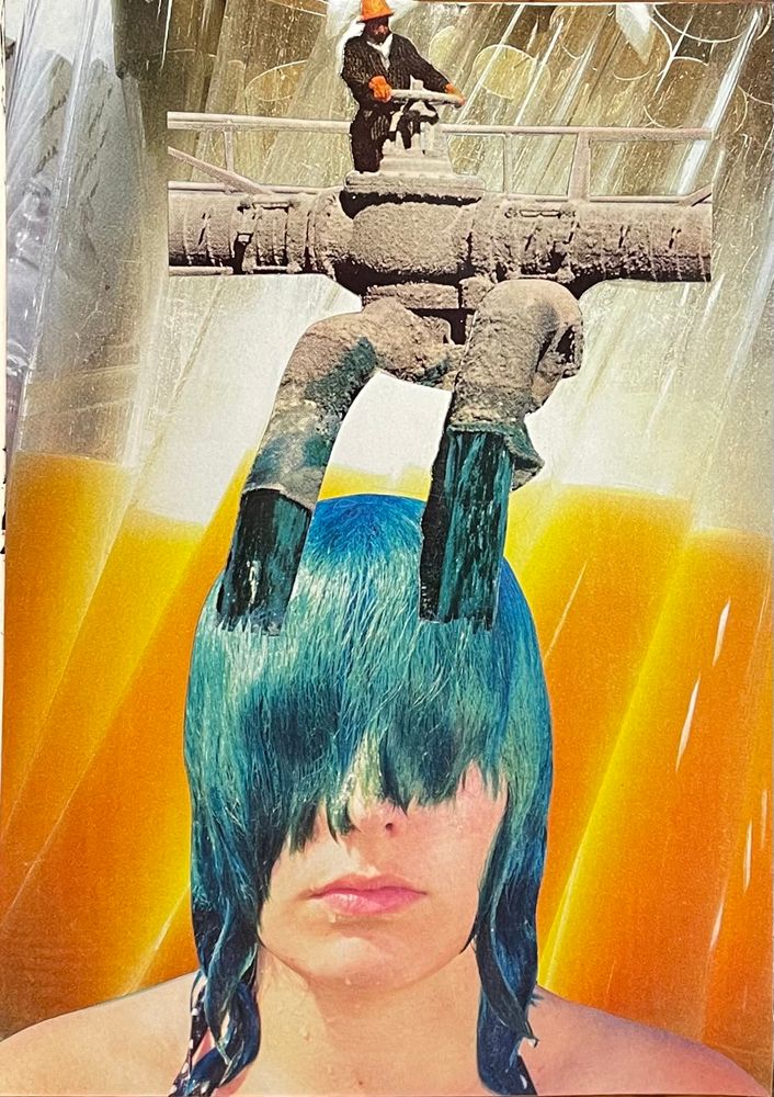Against a background of test tubes with orange liquid is a woman’s head. She has wet turquoise hair that’s covering her eyes. Above her, a man wearing gloves and a hard hat turns a large valve on pipes that are releasing turquoise liquid onto her head. 