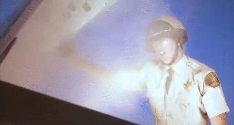 That scene from Repo Man where the cop opens the trunk with the radioactive mcguffin in it and gets vaporized 