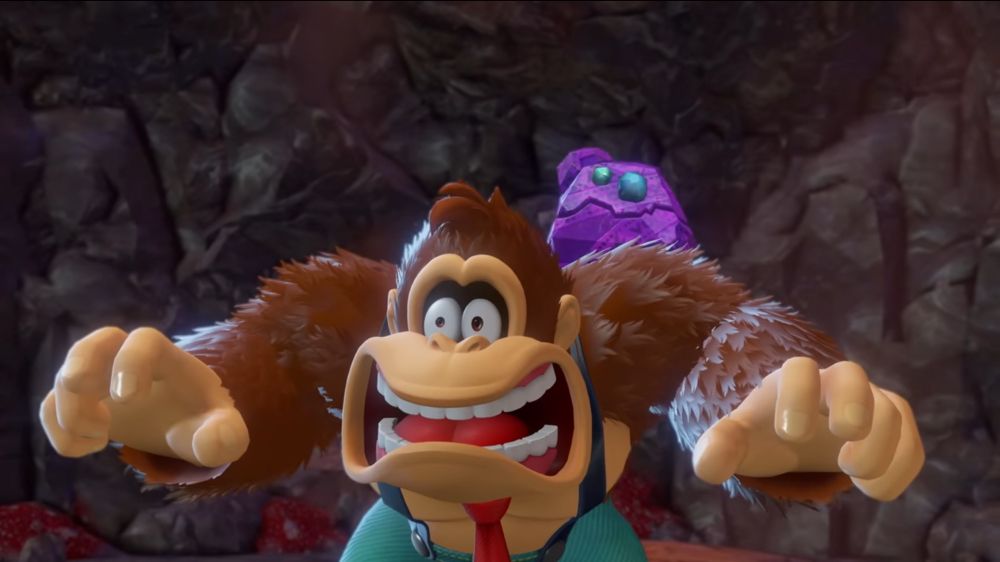 Donkey Kong from Donkey Kong Bonanza with a cartoonishly exaggerated look of shock. He’s hunched over and bow legged with incredibly tense shoulders as his arms hang shakily out to either side of his body.